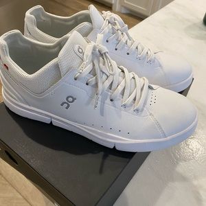 Mens ON Running The Roger. All white. Worn once. New condition. Size 10.5